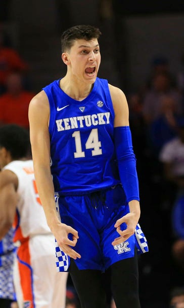 No. 7 Kentucky tightens D, rallies to beat Florida 65-54
